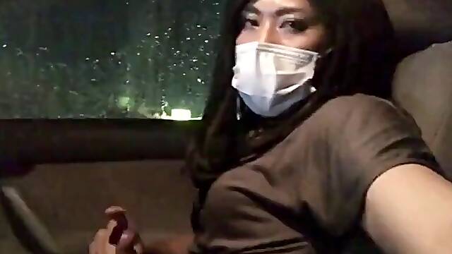 Asian CD masturbates in her car