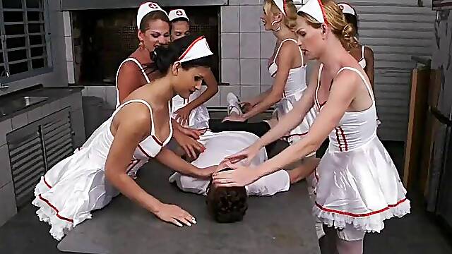 Poor patient gets his ass knocked in the gangbang by the sexy tranny nurses