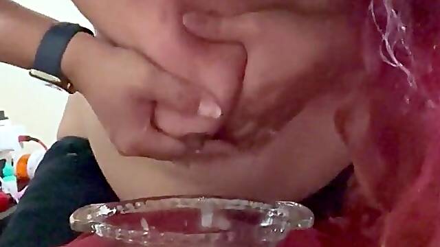 Horny bunny beauty squirting milk into bowl
