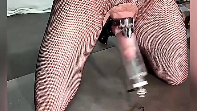 Sissy in Fishnets, Boots, Corset and with a Jock Cage Gets Electro Cum Extraction by Mistresse
