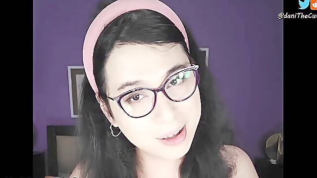Stunning tgirl DaniTheCutie shows off her body before holding a dildo in her taut butt