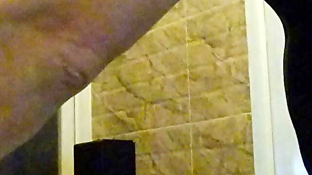 Wetlook in the bathroom in black sport dress and pantyhose. Wet pantyhose and dress.