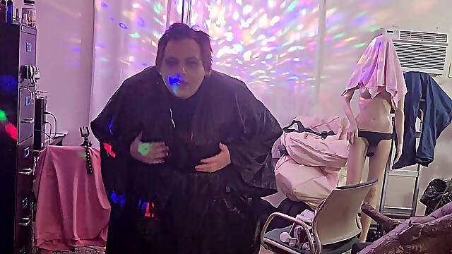 MOLLY is enjoying herself rubbing her genitals dancing to party music in her nice satin dress.